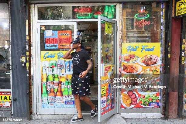 Powerball and Mega Millions lottery advertisement is displayed at a convenience store on July 12, 2023 in the Flatbush neighborhood of the Brooklyn...