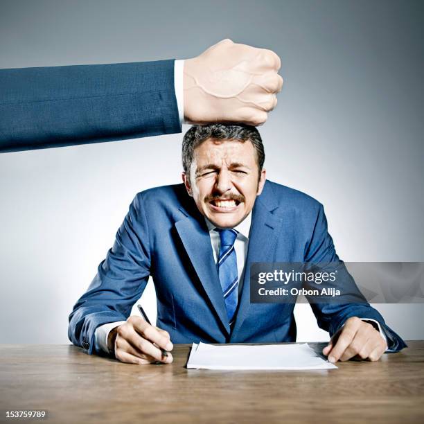 businessman being punched - defeat funny stock pictures, royalty-free photos & images