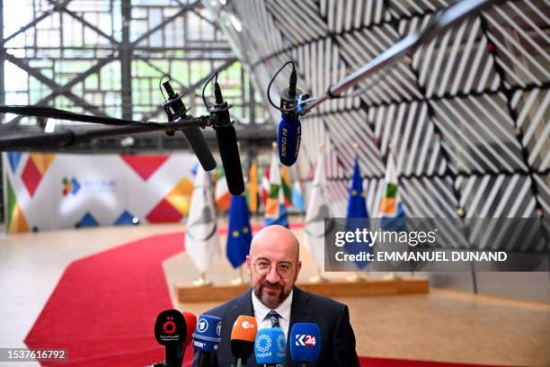 European Council President Charles Michel speaks to the press as he arrives for the first day of a summit of European Union-Community of Latin...