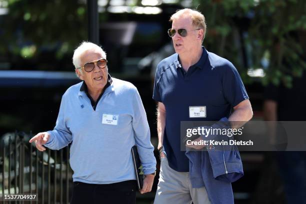 Robert Kraft, CEO of the New England Patriots, and Roger Goodell, Commissioner of the NFL, walk to lunch at the Allen & Company Sun Valley Conference...