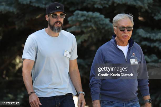 Josh Kroenke and Stan Kroenke, owner of Kroenke Sports and Entertainment, walk to lunch at the Allen & Company Sun Valley Conference on July 12, 2023...