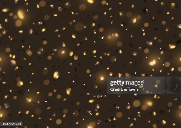 glittering gold confetti - string lights on black stock illustrations