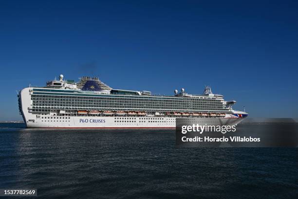Ventura, a 116,017 GT Grand-class cruise ship of the P&O Cruises fleet, sails the Tagus River after leaving the city's cruise terminal on July 12 in...