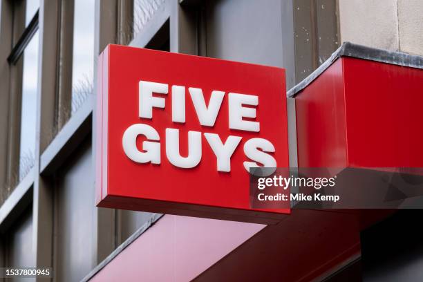 Sign for the food and burger restaurant brand Five Guys on 6th July 2023 in London, United Kingdom.