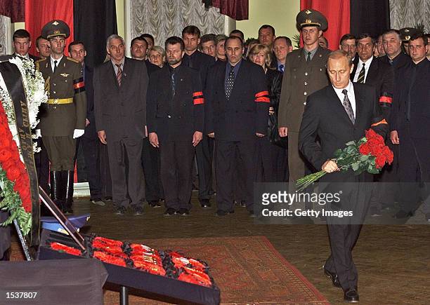 Russian President Vladimir Putin pays his last respects to the late Gen. Alexander Lebed, governor of the Krasnoyarsk region, during his funeral at...