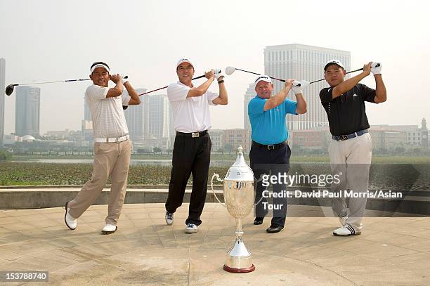 Thongchai Jaidee of Thailand, Zhang Lian-wei of China, Ian Woosnam of Wales and Chan Yih-shin of Chinese Taipei stand for a photograph ahead of the...