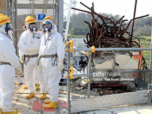 Japanese Prime Minister Yoshihiko Noda , wearing radiation protection gears inspects crippled Tokyo Electric Power Co., Fukushima Daiichi Nuclear...