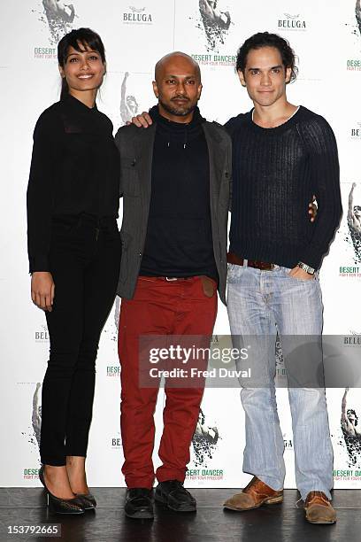 Freida Pinto, Akram Khan and Reece Ritchie attend a photocall for 'Desert Dancer' at Sadler's Wells Theatre on October 9, 2012 in London, England.