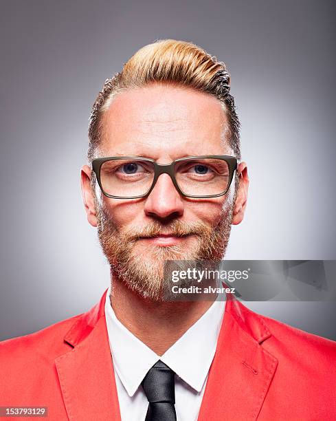 portrait of a man in the studio - red eyeglasses stock pictures, royalty-free photos & images