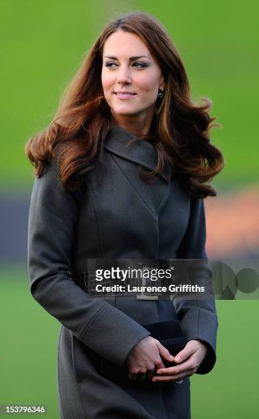 Catherine, Duchess of Cambridge arrives to meet the England team as they visit a training session at St Georges Park on October 9, 2012 in...
