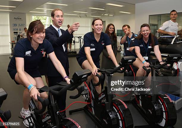 Prince William, Duke of Cambridge and Catherine, Duchess of Cambridge meet ladies on training bikes in the new gym during the official launch of The...