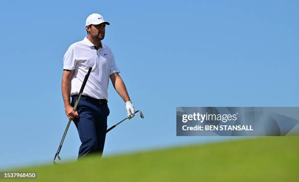 Golfer Scottie Scheffler walks on the fifth fairway during a practice round for 151st British Open Golf Championship at Royal Liverpool Golf Course...