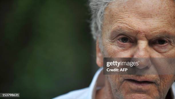 French actor Jean-Louis Trintignant poses during a photocall for 'Amour' on October 9, 2012 in Rome. 'Amour' a film by Austrian film director Michael...