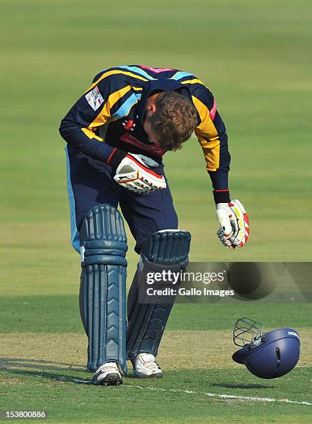 David Miller of Yorkshire goes down after being struck by a bouncer during the Karbonn Smart CLT20 pre-tournament Qualifying Stage match between...