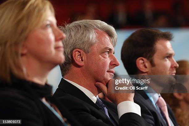 Andrew Lansley , the Leader of the House of Commons, listens to Health Secretary Jeremy Hunt's speech to the Conservative party conference in the...