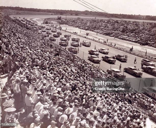 September 7, 1953: General view of a standing-room-only crowd looks on as the field lines up for the start of the Southern 500 NASCAR Cup race at...