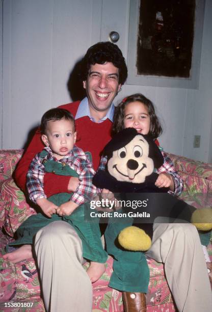 Musician Jon Bauman of Sha Na Na, daughter Nora Bauman and son Eli Bauman being photographed for exclusive photo session on December 20, 1983 at Jon...