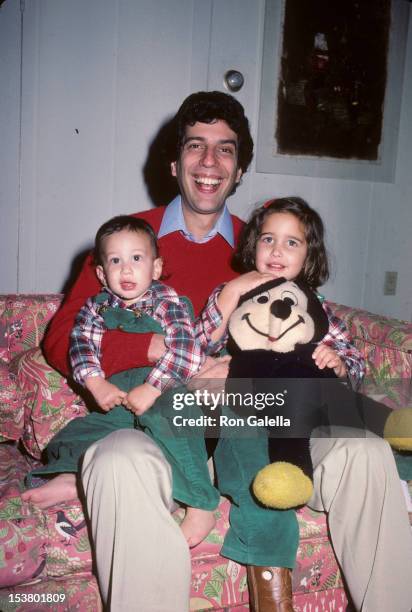 Musician Jon Bauman of Sha Na Na, daughter Nora Bauman and son Eli Bauman being photographed for exclusive photo session on December 20, 1983 at Jon...