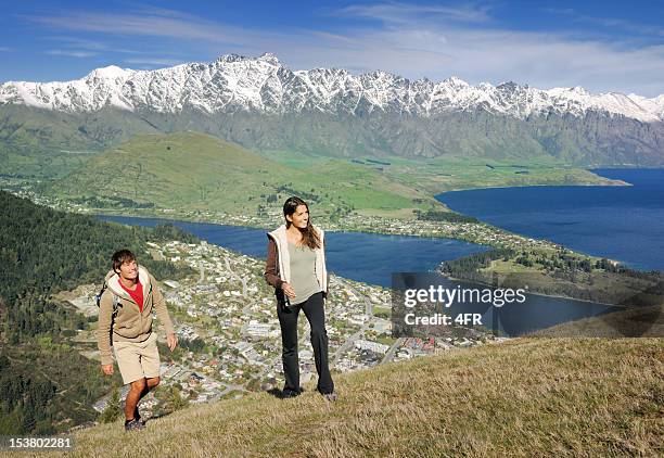 couple hiking in new zealand (xxxl) - otago landscape stock pictures, royalty-free photos & images