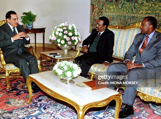 Egyptian President Hosni Mubarak meets with Somali faction leaders Hussein Mohamed Aidid and Ali Mahdi Mohamed , 25 December. The two warlords signed...