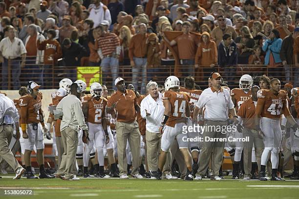 Texas head coach Mack Brown talking to QB David Ash during game vs West Virginia at Darrell K Royal Texas Memorial Stadium. Austin, TX 10/6/2012...