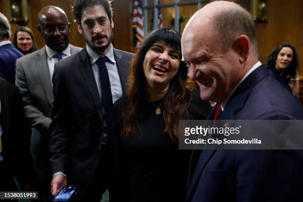 Senate Judiciary Committee Intellectual Property Subcommittee Chair Chris Coons talks with independent concept artist and illustrator Karla Ortiz at...