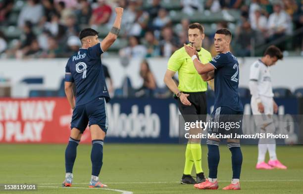 Alan Pulido of Sporting Kansas City scores a goal and celebrates during a game between Sporting Kansas City and Los Angeles Galaxy at Dignity Health...