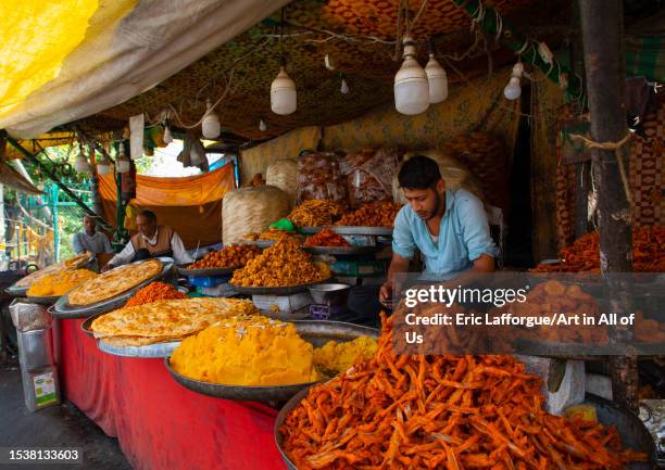 Indian men selling tradional street food, Jammu and Kashmir, Srinagar, India on June 12, 2023 in Srinagar, India.