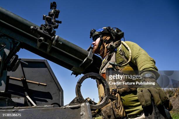 Soldier of a separate Territorial Defense brigade from Dnipro prepares rockets for the Partizan mobile rocket launcher, Zaporizhzhia Region,...