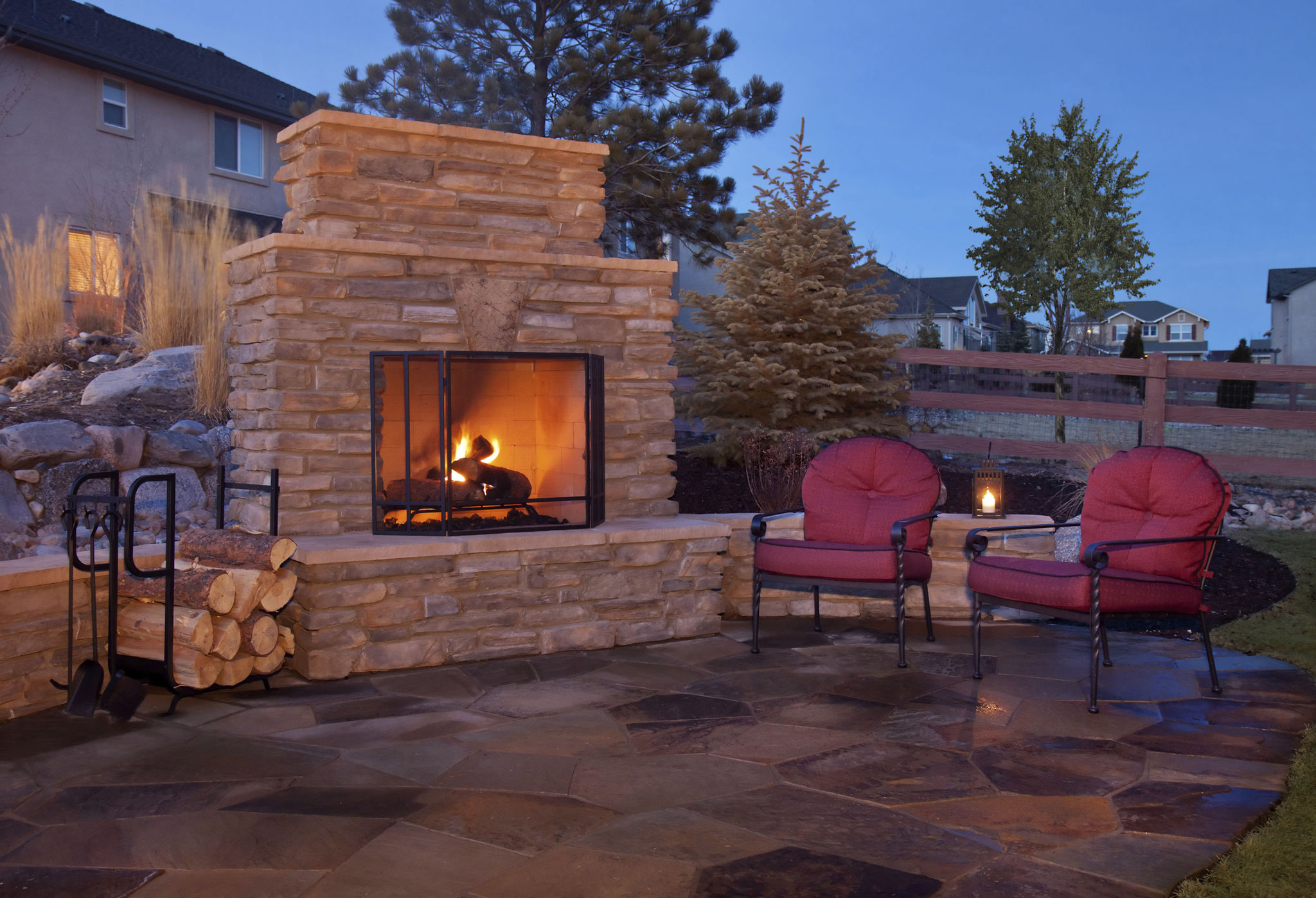 Outdoor flagstone platform with fireplace, chairs Outdoor flagstone platform with fireplace, chairs