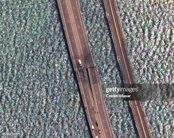 Maxar satellite imagery showing a super closeup view of Kerch Strait and the new damage to the Crimea Bridge which connects Crimea to Russia's...