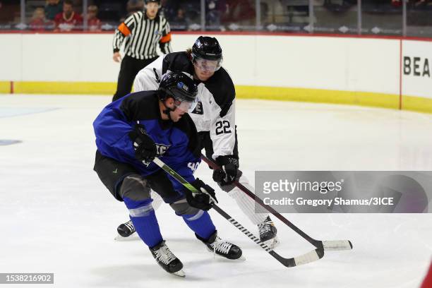 Robert Farnham of Team Johnston battles with Mitchell Fossier of Team Fuhr during 3ICE - Week 3 action at the Van Andel Arena on July 12, 2023 in...