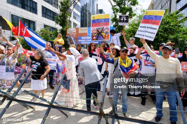 Latinos form the diaspora demonstrate during an European Union and Community of Latin American and Caribbean States summit in the Europa, the EU...