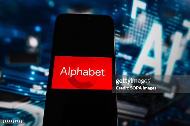 In this photo illustration a Google Alphabet logo is displayed on a smartphone with artificial intelligence illustration on the background.