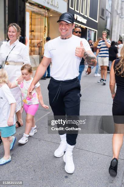 Dee Devlin and Conor McGregor are seen in Midtown on July 12, 2023 in New York City.