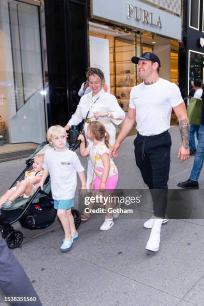 Dee Devlin and Conor McGregor are seen in Midtown on July 12, 2023 in New York City.