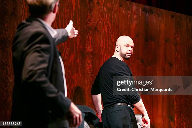 Robert Gallinowski and Guntbert Warns perform on stage during 'Ein Bisschen Ruhe Vor Dem Sturm' play at Renaissance Theater Berlin on October 09,...