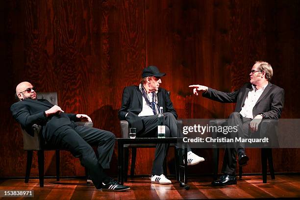 Robert Gallinowski , Joerg Gudzuhn and Guntbert Warns perform on stage during 'Ein Bisschen Ruhe Vor Dem Sturm' play at Renaissance Theater Berlin on...