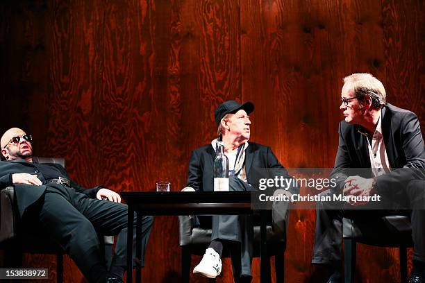 Robert Gallinowski , Joerg Gudzuhn and Guntbert Warns perform on stage during 'Ein Bisschen Ruhe Vor Dem Sturm' play at Renaissance Theater Berlin on...