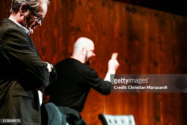 Robert Gallinowski and Guntbert Warns perform on stage during 'Ein Bisschen Ruhe Vor Dem Sturm' play at Renaissance Theater Berlin on October 09,...