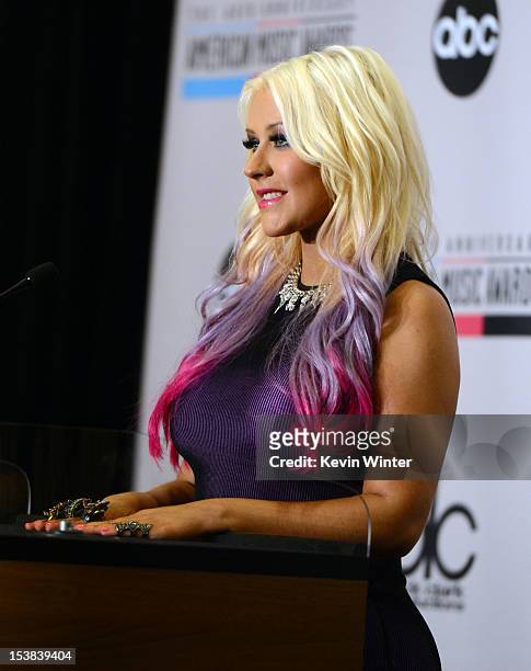 Singer Christina Aguilera speaks onstage during the 40th Anniversary American Music Awards nominations press conference at the JW Marriott Los...