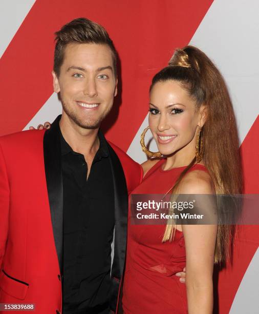 Singers Lance Bass and Kimberly Cole pose during the 40th Anniversary American Music Awards nominations press conference at the JW Marriott Los...