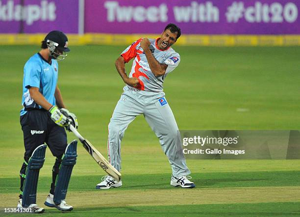 Sarfraz Ahmad of Sialkot celebrates the wicket of Colin de Grandhomme of Auckland for a duck during the Karbonn Smart CLT20 pre-tournament Qualifying...