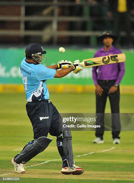 Azhar Mahmood of Auckland hooks a delivery during the Karbonn Smart CLT20 pre-tournament Qualifying Stage match between Sialkot Stallions of Pakistan...