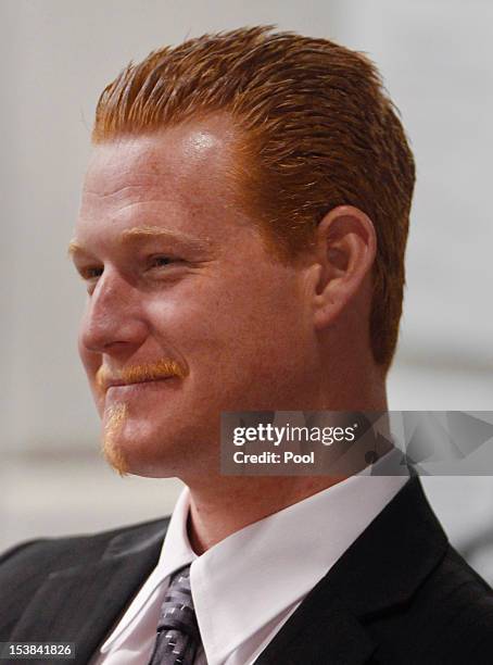 Redmond O'Neal smiles while Judge Keith Schwartz compliments him on his recovery efforts in the Airport Branch Courthouse October 9, 2012 in Los...