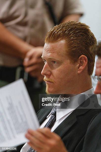 With his attorney, Richard Pintal at his side, Redmond O'Neal listens to the conditions of his probation inside the Airport Branch Courthouse October...