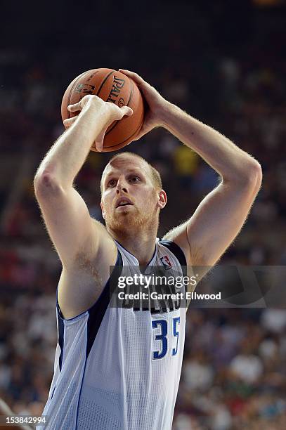 Chris Kaman of the Dallas Mavericks shoots a free throw against FC Barcelona Regal during NBA Europe Live 2012 on October 9, 2012 at Palau Sant Jordi...