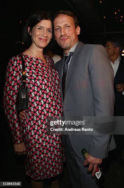 Wotan Wilke Moehring and partner Anna Theis attend the 'Mann Tut Was Mann Kann' Germany Premiere after show party on October 9, 2012 in Berlin,...