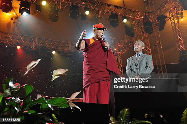 His Holiness the Dalai Lama speaks onstage at the One World Concert at Syracuse University on October 9, 2012 in Syracuse, New York.