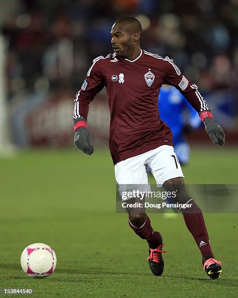 Omar Cummings of the Colorado Rapids controls the ball against the San Jose Earthquakes at Dick's Sporting Goods Park on October 6, 2012 in Commerce...